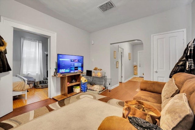 living room with wood-type flooring