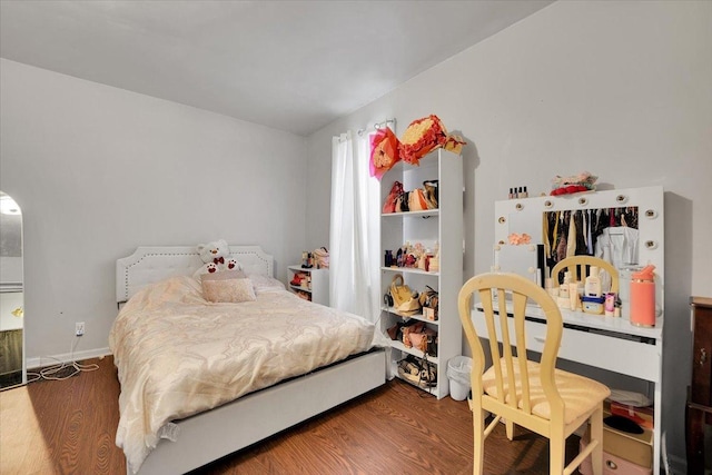 bedroom featuring dark hardwood / wood-style floors