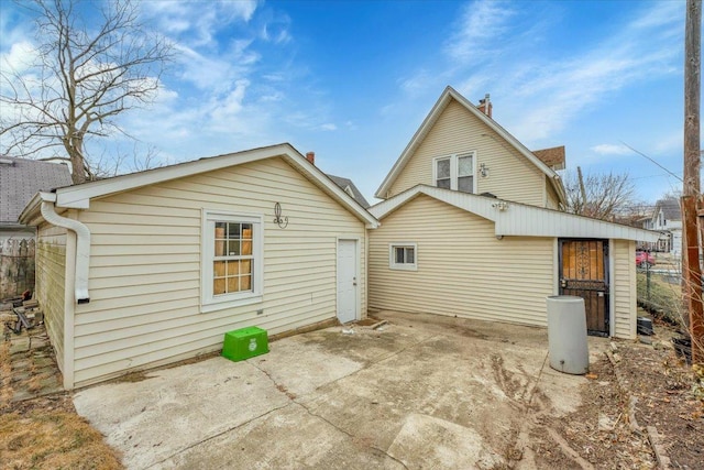 back of house featuring a patio