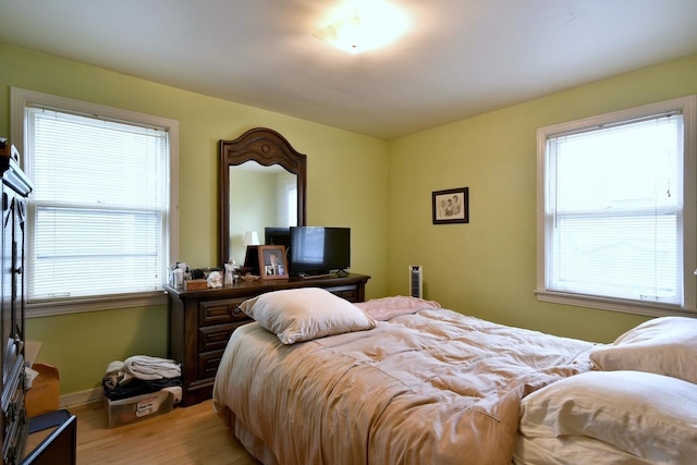 bedroom featuring light wood-type flooring