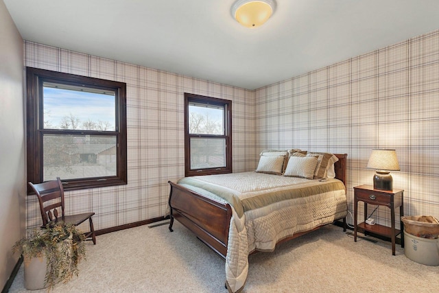 bedroom featuring light colored carpet