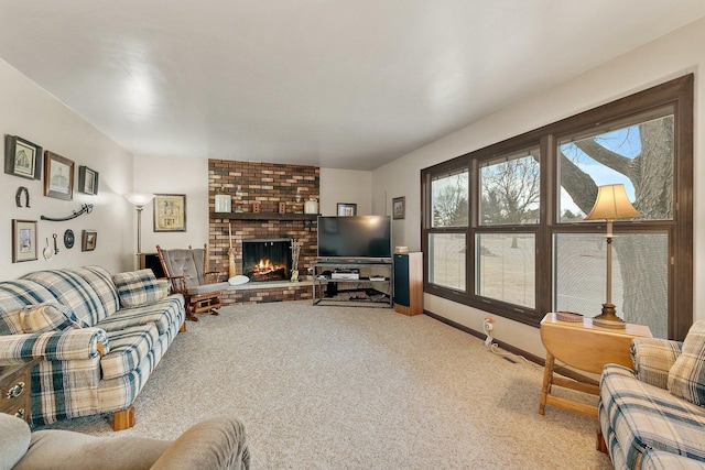 living room with a fireplace and light carpet