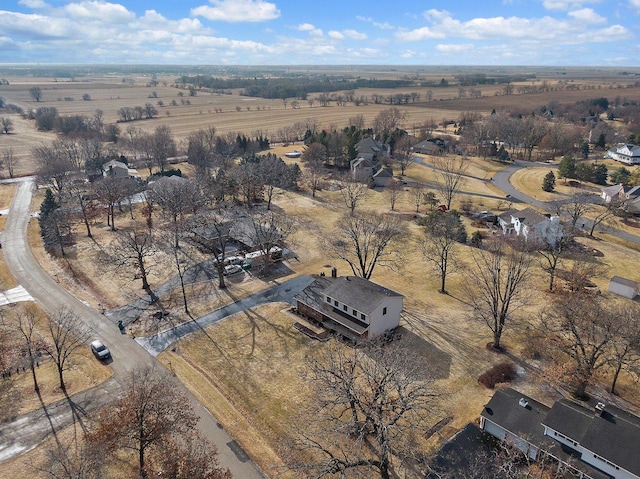 birds eye view of property with a rural view