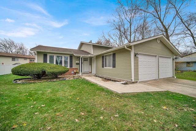 view of front of home featuring a garage and a front lawn