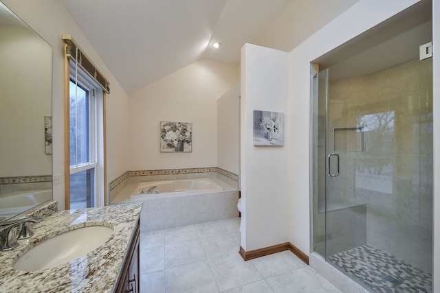 full bathroom featuring tile patterned flooring, vanity, vaulted ceiling, shower with separate bathtub, and toilet