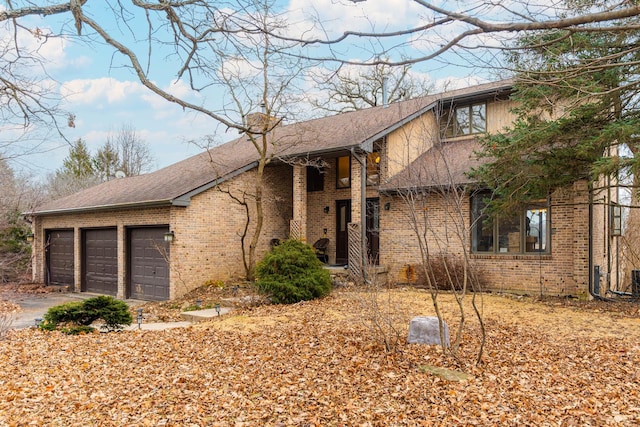 view of front of home featuring a garage, brick siding, a shingled roof, and a chimney