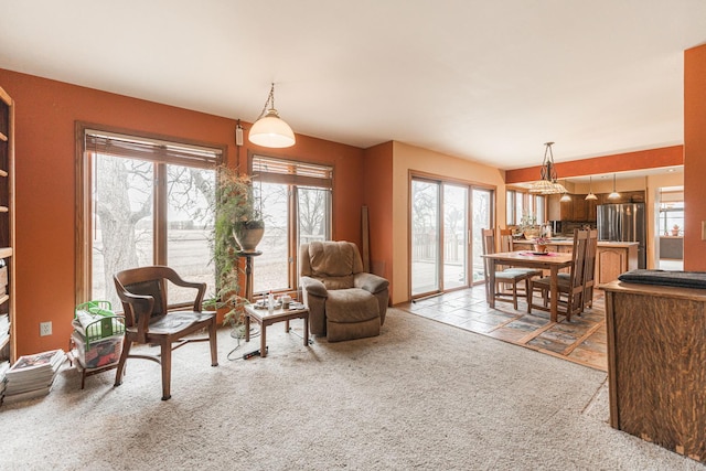 living area with carpet flooring