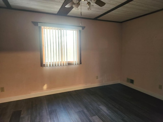 empty room with dark wood-type flooring, ceiling fan, and wood ceiling