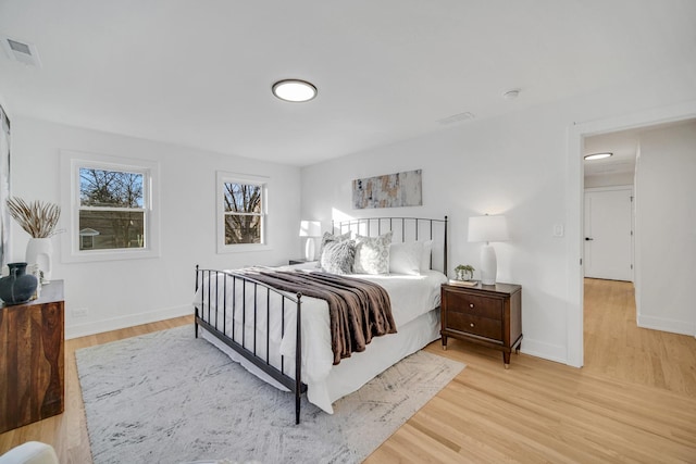 bedroom featuring light wood-type flooring