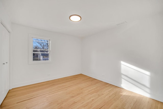 empty room featuring light hardwood / wood-style floors