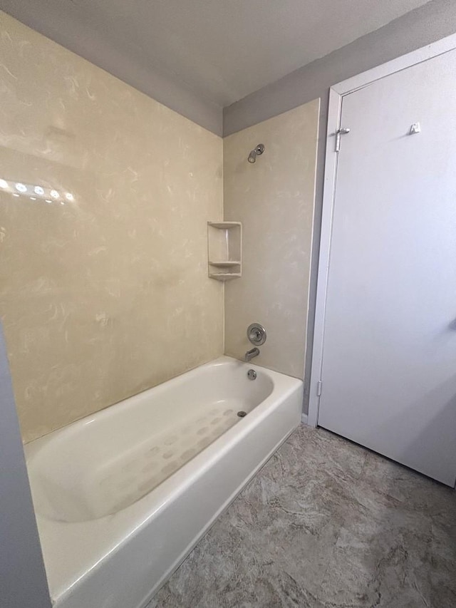 bathroom featuring shower / washtub combination