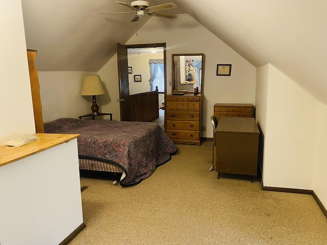 bedroom with light carpet, vaulted ceiling, and ceiling fan