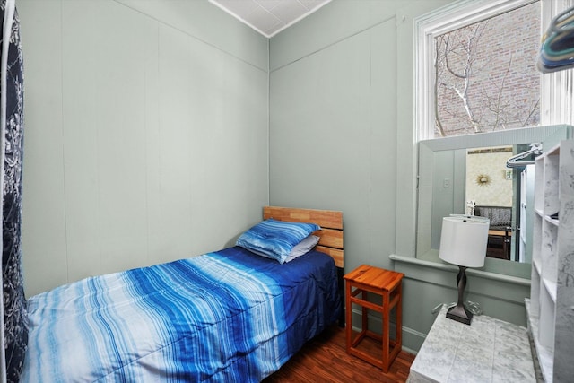 bedroom featuring dark wood-style floors