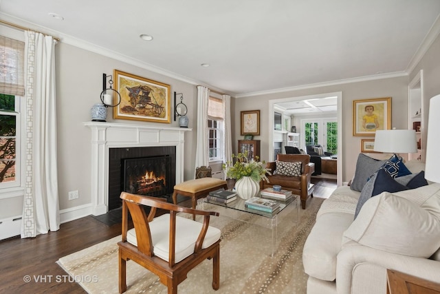 living room with ornamental molding and dark hardwood / wood-style floors
