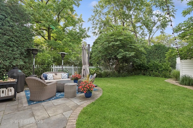view of yard featuring a patio and an outdoor hangout area