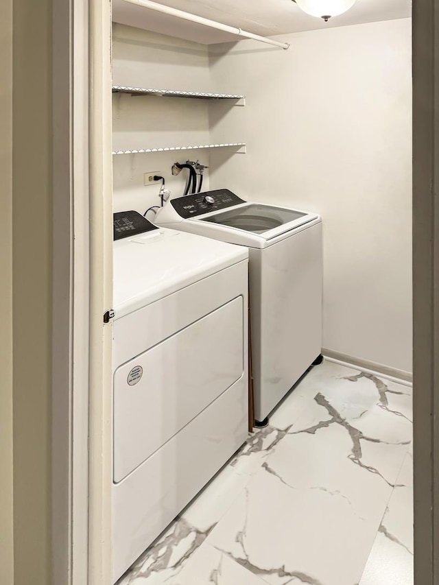 laundry room featuring washer and dryer