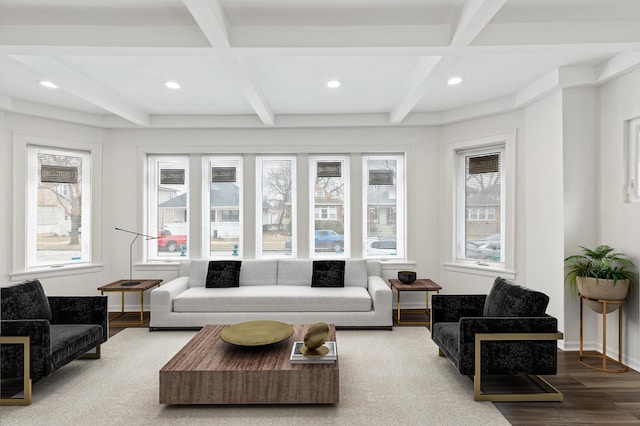 living room with coffered ceiling, hardwood / wood-style floors, and beamed ceiling