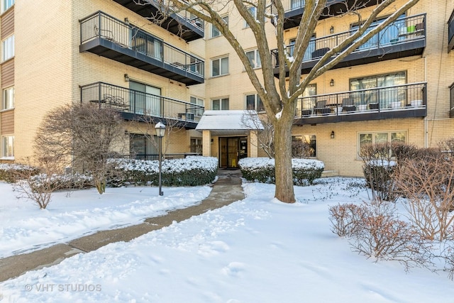 view of snow covered property