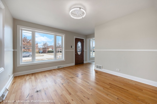 entryway with light hardwood / wood-style floors