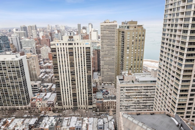 property's view of city featuring a water view