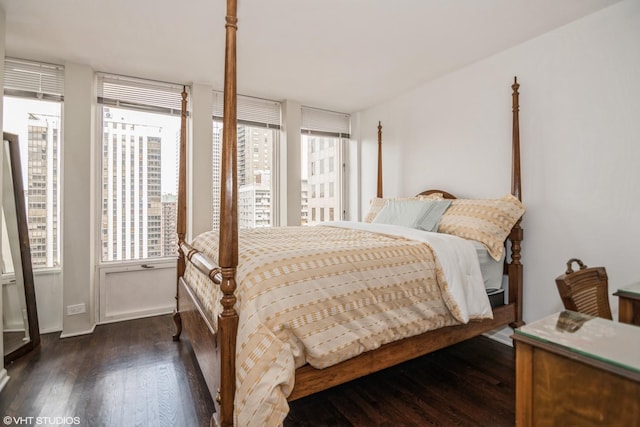 bedroom featuring dark hardwood / wood-style floors