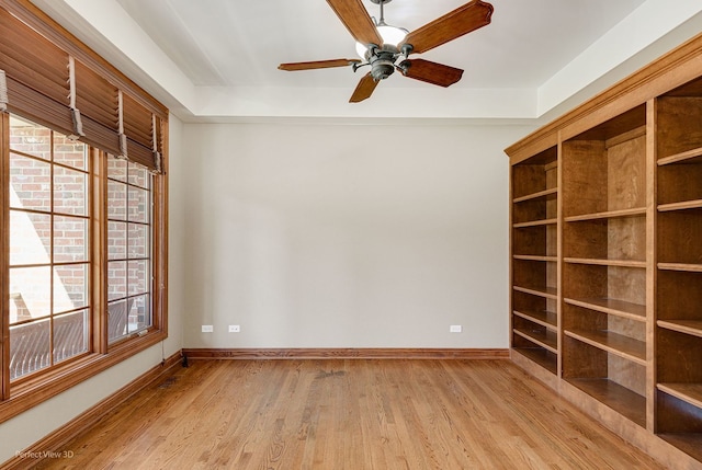 unfurnished room with light hardwood / wood-style flooring and ceiling fan