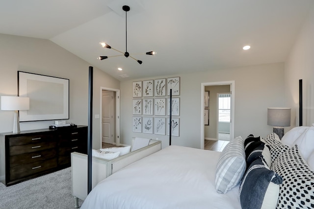 bedroom featuring light carpet, vaulted ceiling, and ceiling fan