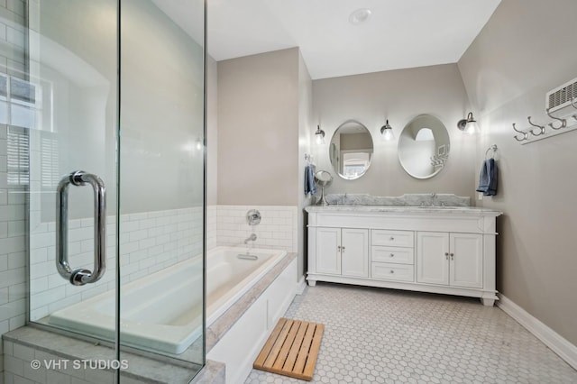 full bath with an enclosed shower, a sink, double vanity, baseboards, and a bath