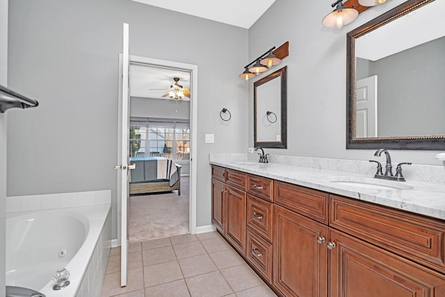 bathroom with vanity, a bathing tub, tile patterned floors, and ceiling fan