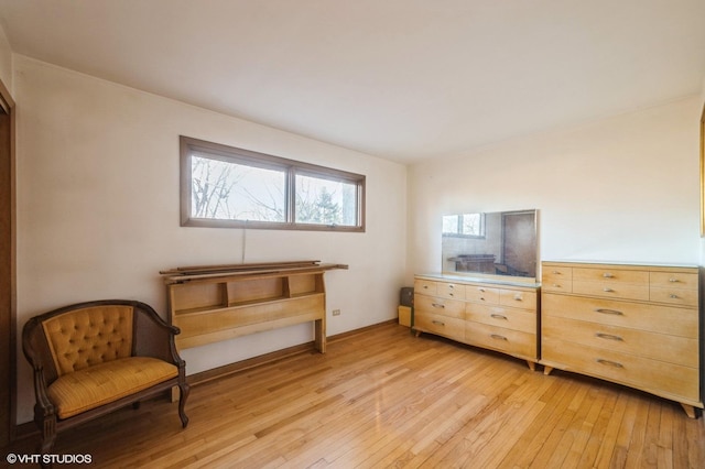 living area with light hardwood / wood-style floors