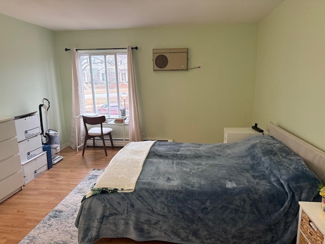 bedroom with light wood-type flooring