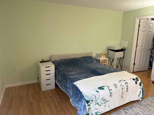 bedroom featuring hardwood / wood-style flooring