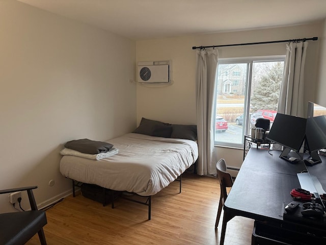 bedroom featuring light hardwood / wood-style floors