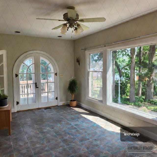 interior space featuring french doors and ceiling fan