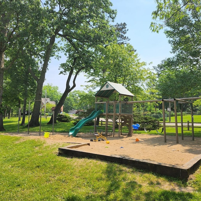 view of playground with a yard