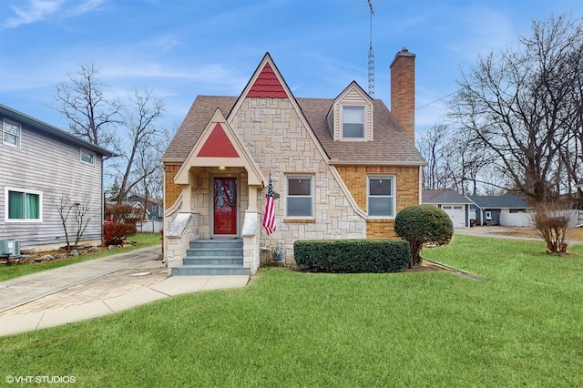 view of front of home with a front lawn