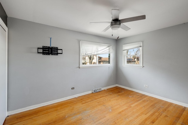 170 N Normandy Dr, Chicago Heights, IL 60411 - unfurnished room with ceiling fan and hardwood / wood-style floors