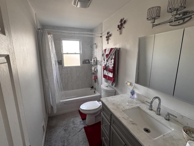 full bathroom featuring shower / tub combo with curtain, vanity, and toilet