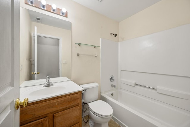 full bathroom featuring shower / bath combination, vanity, and toilet