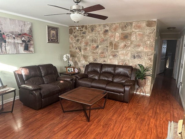 living room featuring crown molding, ceiling fan, and dark hardwood / wood-style flooring