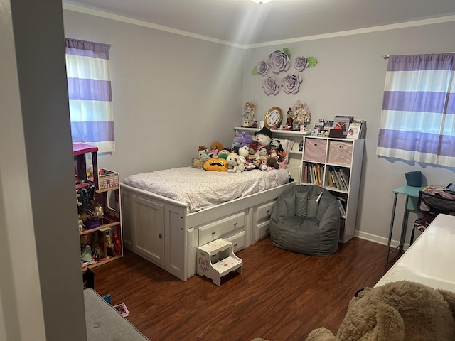 bedroom with crown molding and dark wood-type flooring