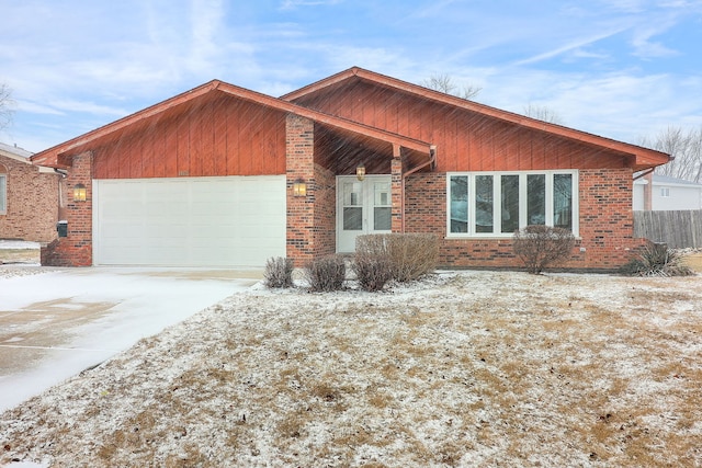 single story home featuring a garage