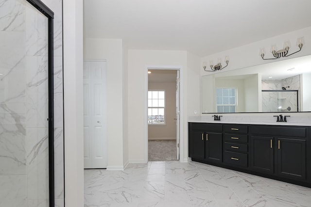 bathroom featuring vanity and a shower with door