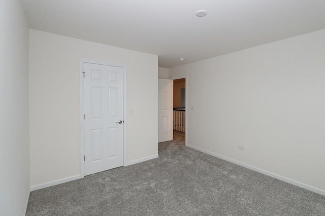 unfurnished bedroom featuring carpet floors