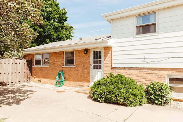 doorway to property with a patio