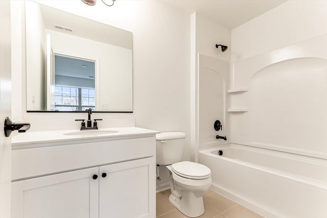 full bathroom with tile patterned floors, toilet, tub / shower combination, and vanity