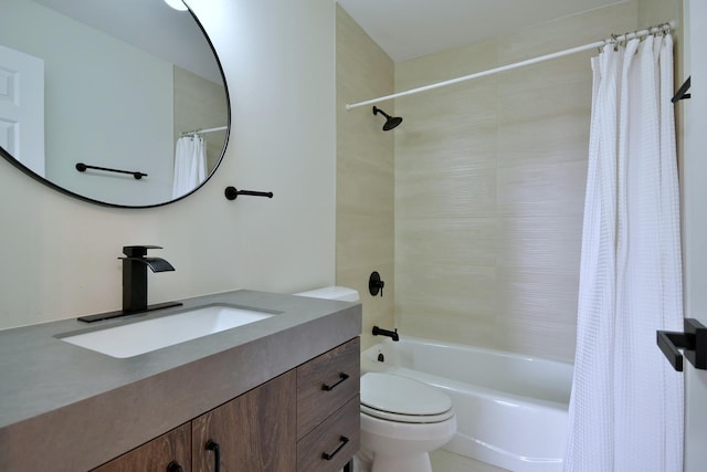 full bathroom featuring vanity, toilet, and shower / tub combo