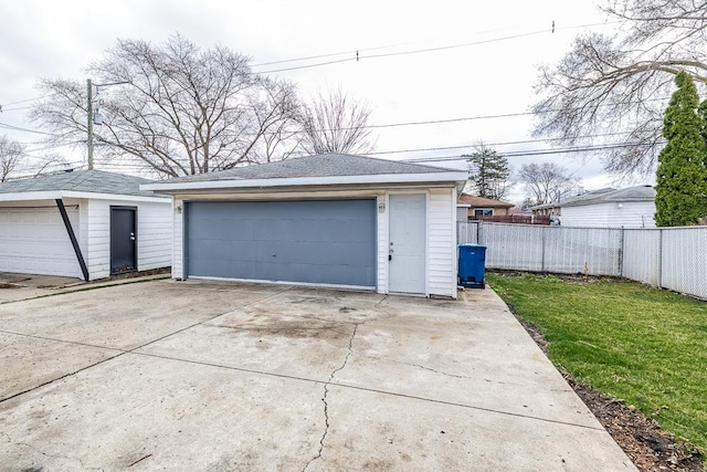 detached garage with fence