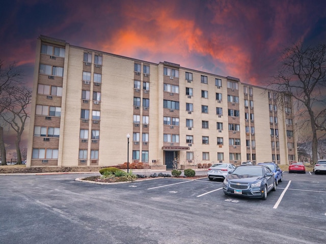 view of outdoor building at dusk