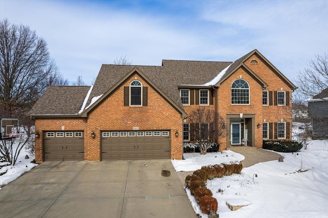 view of front of property with a garage